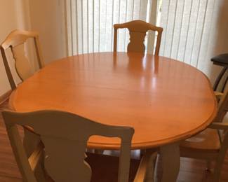 Dining table by Bassett - pictured with one leaf in.