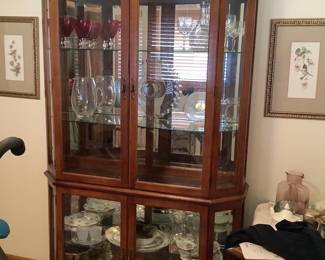 Glass shelves lighted hutch