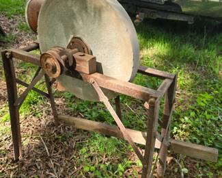 grinding stone on stand