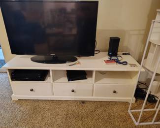 2 flat screen Tvs and TV Stand