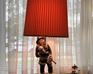 Vintage firefighter figural tale lamp.