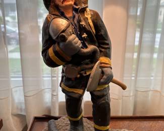 Vintage firefighter figural tale lamp.
