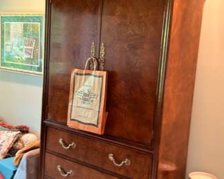 Dark wood armoire wardrobe cabinet, brass bail handles, vintage bedroom furniture storage