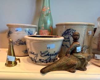 Blue and white stoneware Merry Christmas crocks, brass bell, cast iron frog