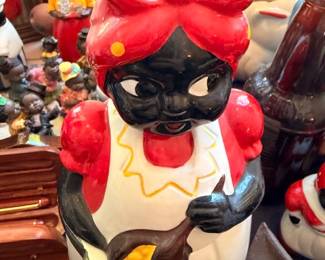 Vintage Black Americana ceramic figurine with red bow