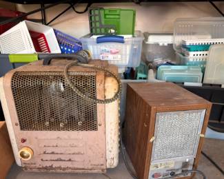 Vintage electric space heaters pair, retro metal heater with cloth cord, wood cabinet heater