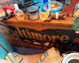 Vintage Baltimore wooden shipping crate with collectibles and figurines