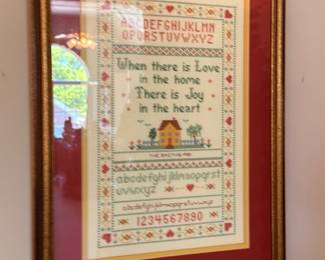 Framed cross-stitch sampler, alphabet, house motif, vintage needlework wall art