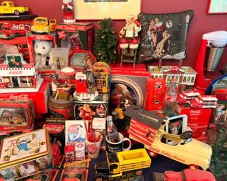 Massive Coca-Cola memorabilia collection, vintage Coke trucks, polar bear, Santa figurines, tins