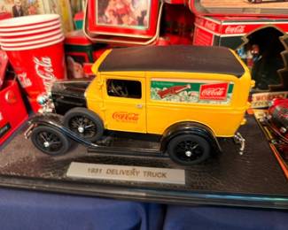 Coca-Cola 1931 Delivery Truck die-cast model, yellow Coke truck on display base