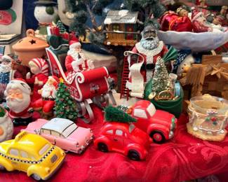 Vintage toy cars, red truck, Santa figurines, Christmas collectibles table lot