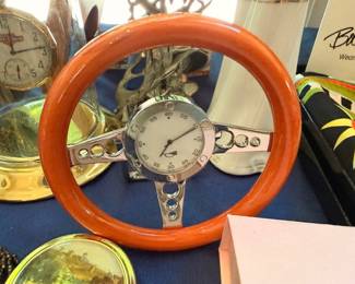 Miniature steering wheel desk clock with wood grain and chrome