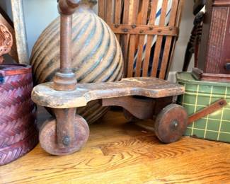 Antique carved twisted wood pedestal, wooden platform cart on wheels, primitive decor