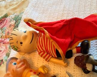 Vintage stuffed tiger plush toy with red cape, collectible children's toy