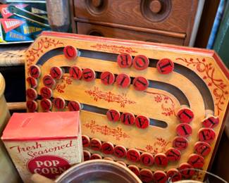 Antique wooden letter game board, vintage Pop Corn box, college pennants