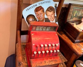 Vintage red toy cash register, Freedom Fighters display, antique child's wooden chair