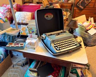 Vintage Smith Corona portable typewriter in case, light blue, retro office collectible