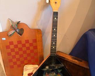 Vintage tenor guitar or ukulele, red and white checkerboard, heart cutting board