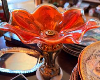 Orange art glass ruffled bowl on brass pedestal stand, vintage decorative centerpiece