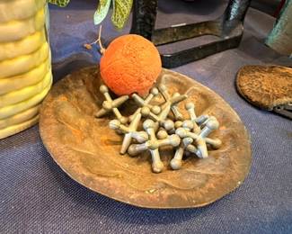 Antique wooden jacks game with ball on brass plate, vintage parlor toy