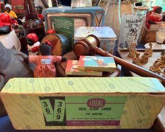 Vintage Ideal flash cards, collectible figurines, and assorted antique toys