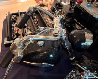 Harley Davidson motorcycle closeup, chrome handlebars, black paint, classic bike