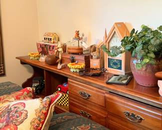 Vintage dresser top with collectible figurines, wooden birdhouse, toy car, home decor lot
