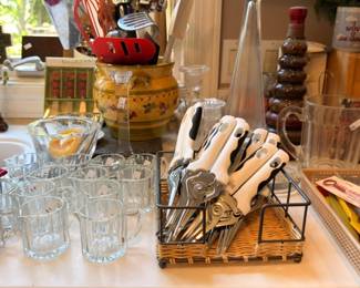 Glass mugs, measuring cups, knife block set, wicker basket, kitchen counter lot