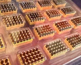 Thimble collection display case, large lot miniature collectibles, organized rows, vintage thimbles
