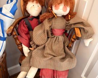 Pair of vintage handmade folk art rag dolls in country clothing, cloth doll collectible
