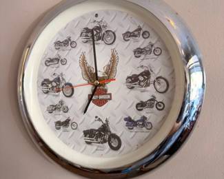 Harley-Davidson motorcycle wall clock, chrome frame, HD eagle logo, bike models as hours