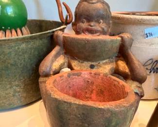 Antique cast iron figural boy at well pump planter, copper bucket