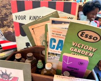Vintage Esso Victory Garden sign, antique books, Original Creole Pralines box