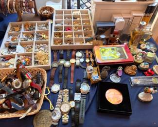 Vintage watch collection, costume jewelry brooches and pins, Gucci perfume, collectible figurines
