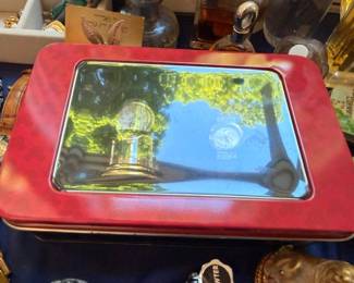 Vintage red collectible tin with mirrored lid