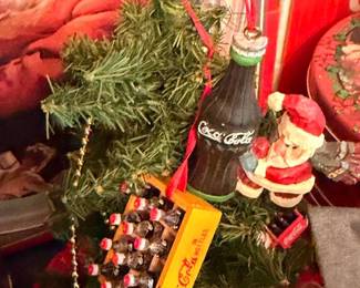 Coca-Cola Christmas display, Coke bottle Santa figurine, holiday tree decorations, Coke collectibles