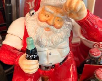 Large Coca-Cola Santa Claus figurine holding Coke bottle, vintage Christmas collectible