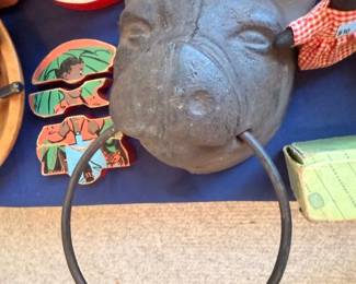 Cast iron pig head towel ring and painted folk art fish decor