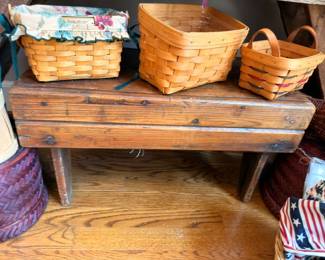 Longaberger baskets on antique wooden bench, Americana quilted items, patriotic decor