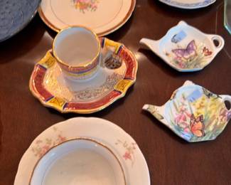 Assorted vintage china plates, teacups, floral pattern dishes, decorative porcelain lot
