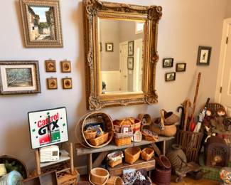 Ornate gold gilt wall mirror, Castrol GTX oil can, framed art, baskets, vintage collectibles