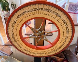 Vintage carnival spinning wheel game, numbered sections, antique gaming collectible