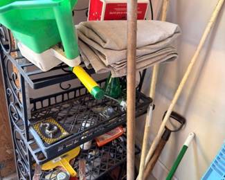 Garage cleaning supplies lot, brooms dustpans mops, yard tools, household items shelf