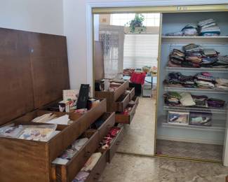 Large cutting table with 4 drawers, patterns and lots of fabric and scraps