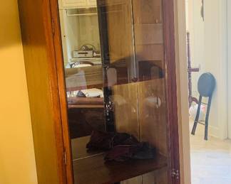 English mahogany museum display case late 19th c. Seven foot tall with brass locking knobs and bowed glass