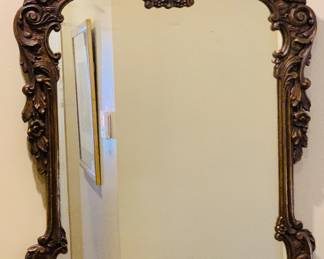 One of five antique wall mirrors