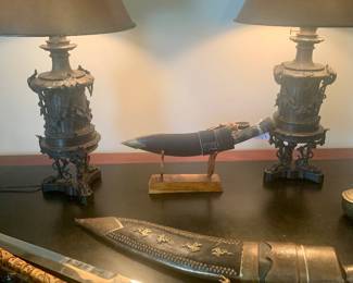 Pair of French bronze oil lampss electrified circa 1900 Featuresivy leaves with three scrollwork legs ending with eagles talons.