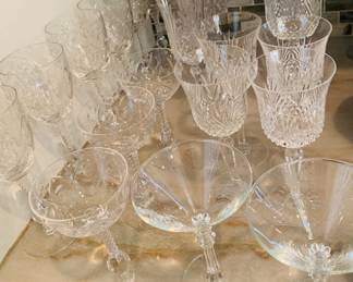 many vintage crystal stems and barware