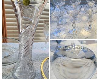 Bohemian crystal vase, a set of Rock Sharpe crystal stemware, and a Steuben glass apple paperweight “Temptations”