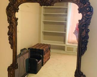 Antique Victorian gilt gesso framed wall mirror with Baroque style scrollwork